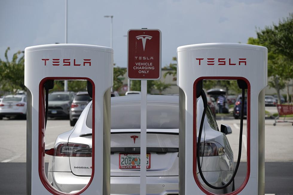 Tesla electric deals car charging stations